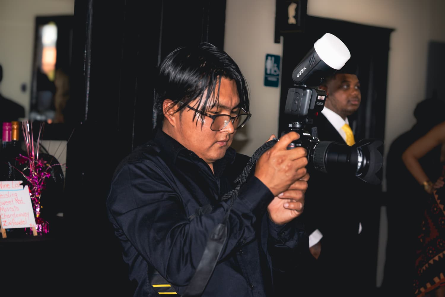 Alfredo Crux fotografiando en evento